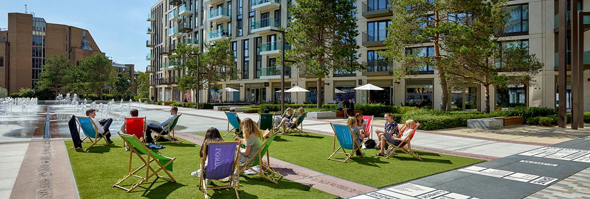 Residents sitting in the community area at London Dock