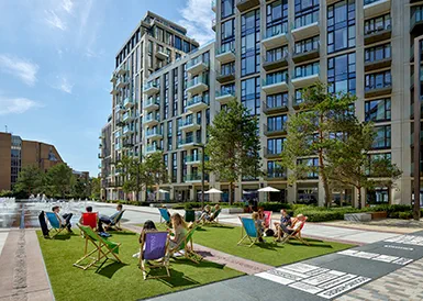 Residents sitting in the community area at London Dock