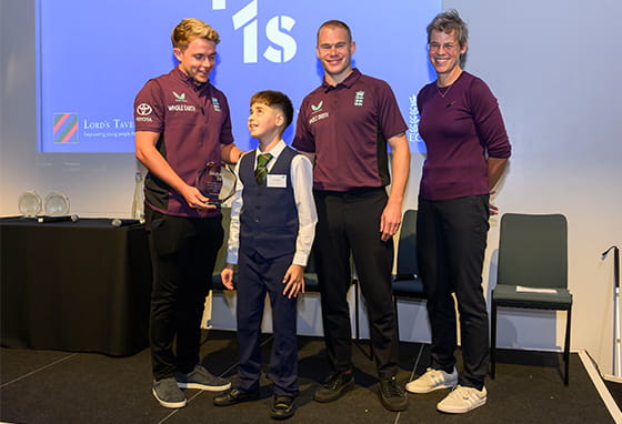 A young boy receiving his Super 1s award