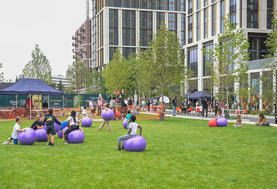 Residents enjoying TwelveTrees Park weekend street party