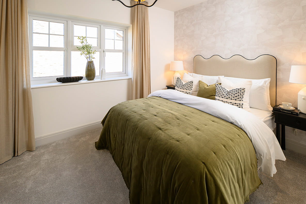 An image of a bedroom within a new Hartland Village showhome