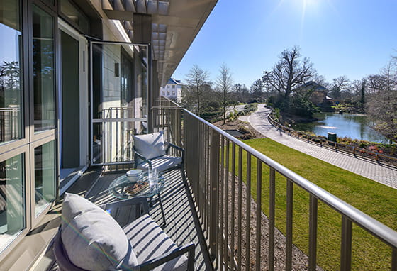 An image of the Balcony looking over the lake at Oakhill