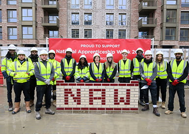 An image of Berkeley apprentices and staff with the Secretary of State for Education at Oval Village