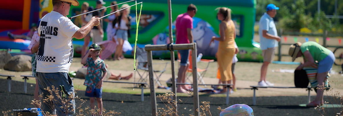 An image of the bouncy castles at Highcrofts Picnic at the Park