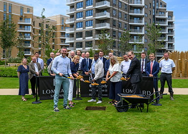 An image of the people celebrating the delivery of the new homes