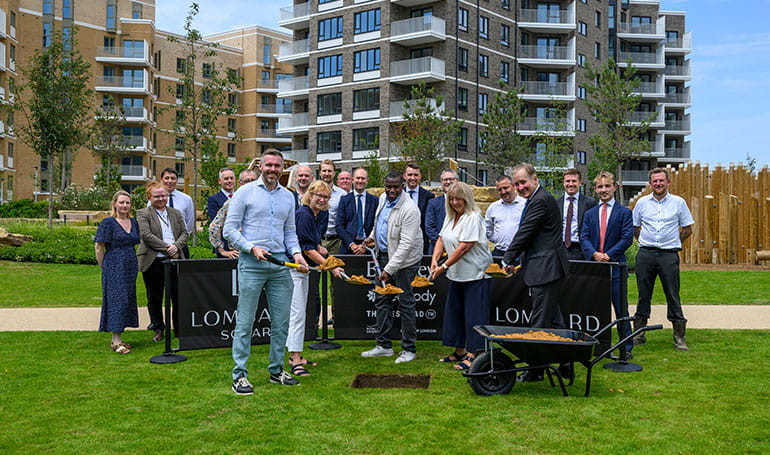 An image of the people celebrating the delivery of the new homes