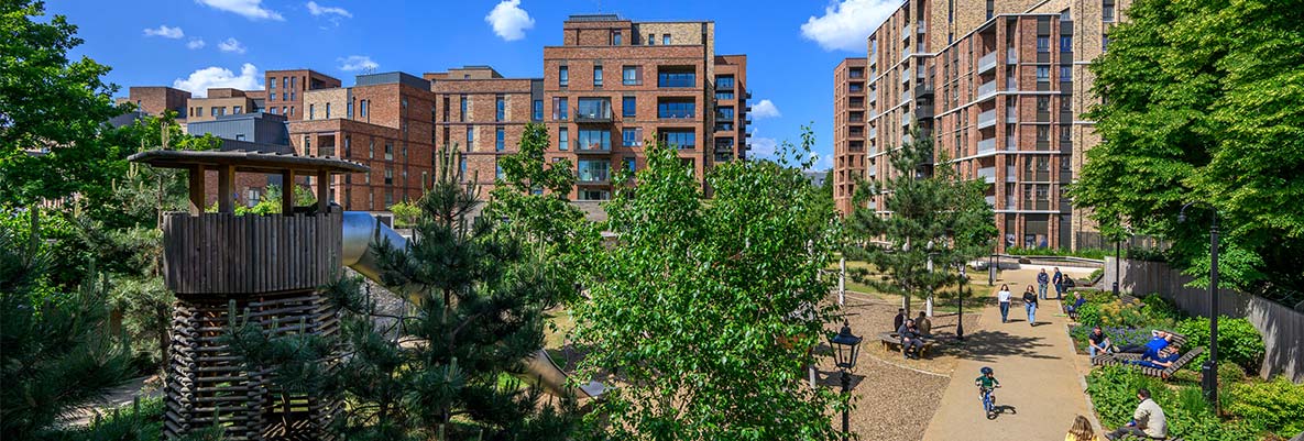 An exterior photograph of a play area in green space at Kidbrooke Village