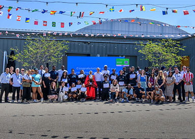 Group photo of participants and representatives for The Green Quarter Street Elite Graduation Ceremony, in Ealing.
