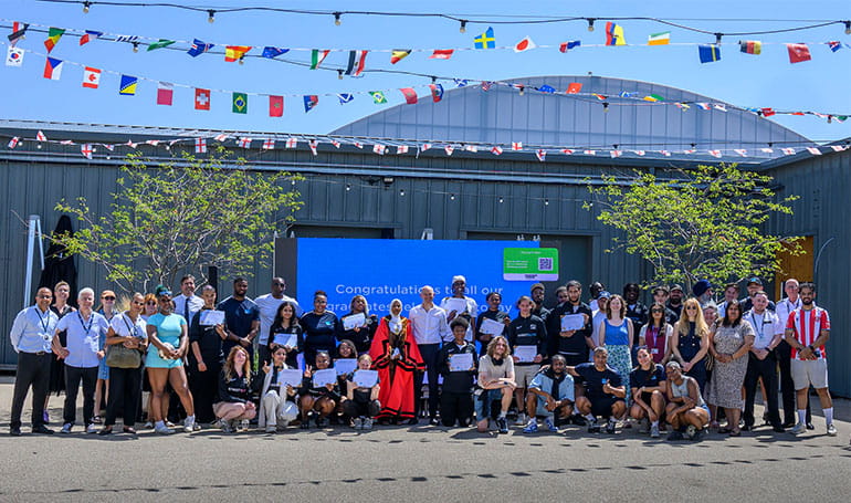 Group photo of participants and representatives for The Green Quarter Street Elite Graduation Ceremony, in Ealing.