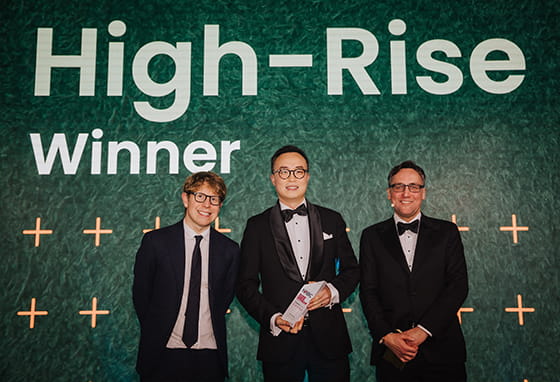 An image of the Senior Project Manager with the winners awards